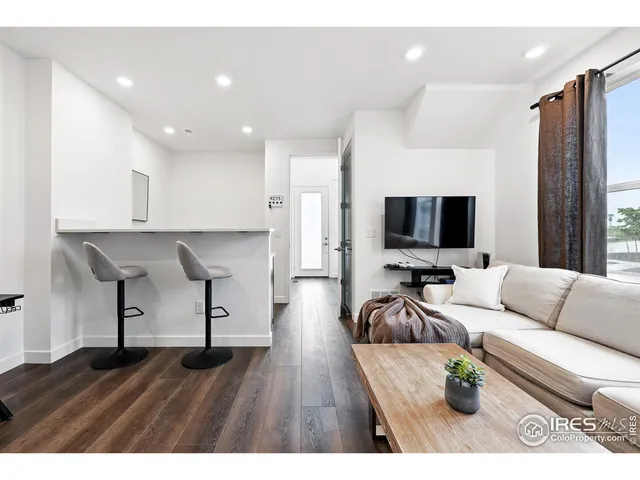 a kitchen with a sink stainless steel appliances and cabinets
