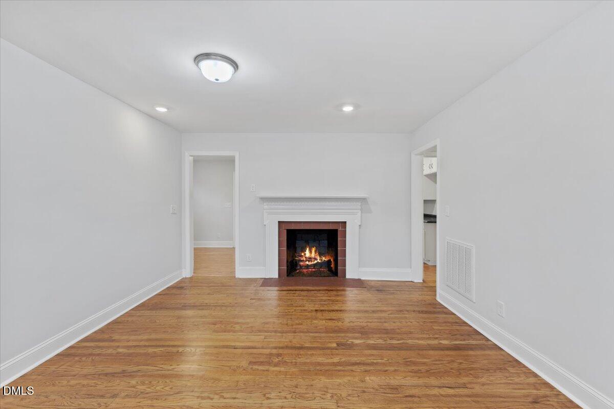 315 Hamilton Street Henderson, NC 27536 - Photo 3 of 13 a view of a livingroom with a fireplace