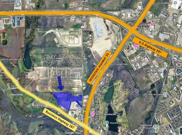 a view of swimming pool with sitting area