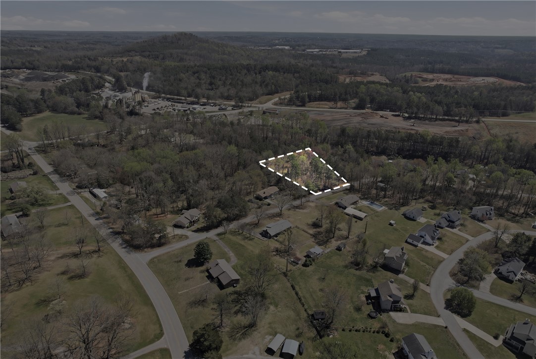 0 Springdale Avenue Liberty, SC 29657 - Photo 11 of 12 This expansive aerial view showcases a desirable lot with surrounding greenery and residential properties.