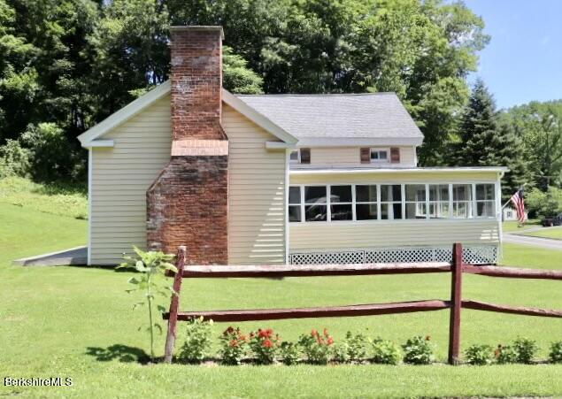 365 Water Street Lee, MA 01238 - Photo 2 of 35 a aerial view of a house with a yard