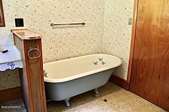 365 Water Street Lee, MA 01238 - Photo 24 of 35 a bathroom with a bathtub and shower