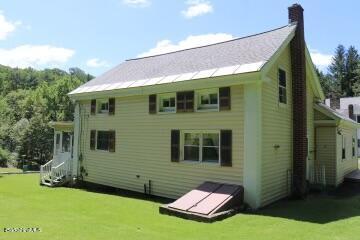 365 Water Street Lee, MA 01238 - Photo 4 of 35 a front view of a house with a yard