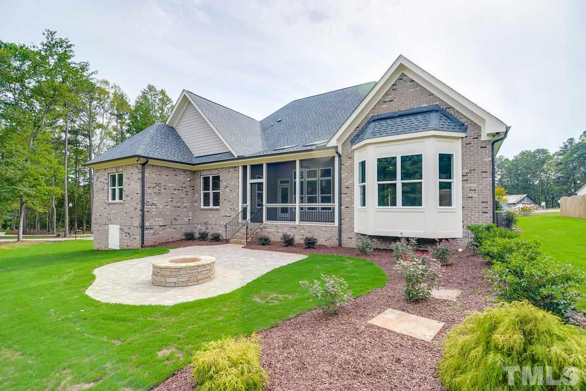 7101 Mary Dee Court, Unit 4 Raleigh, NC 27613 - Photo 22 of 25 Patio & fire pit.