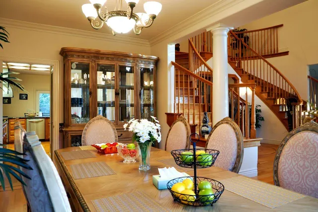 a kitchen with stainless steel appliances granite countertop a stove a refrigerator and a microwave