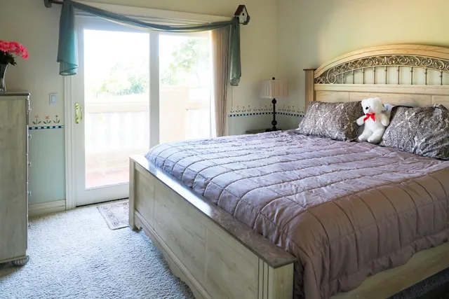 a kitchen with a table and chairs