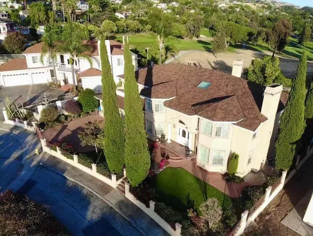 a view of front door and deck of the house