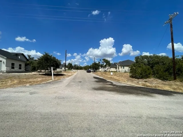 a view of a building with a yard