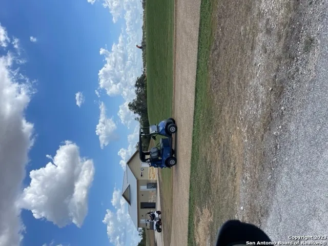 a view of lake with green space