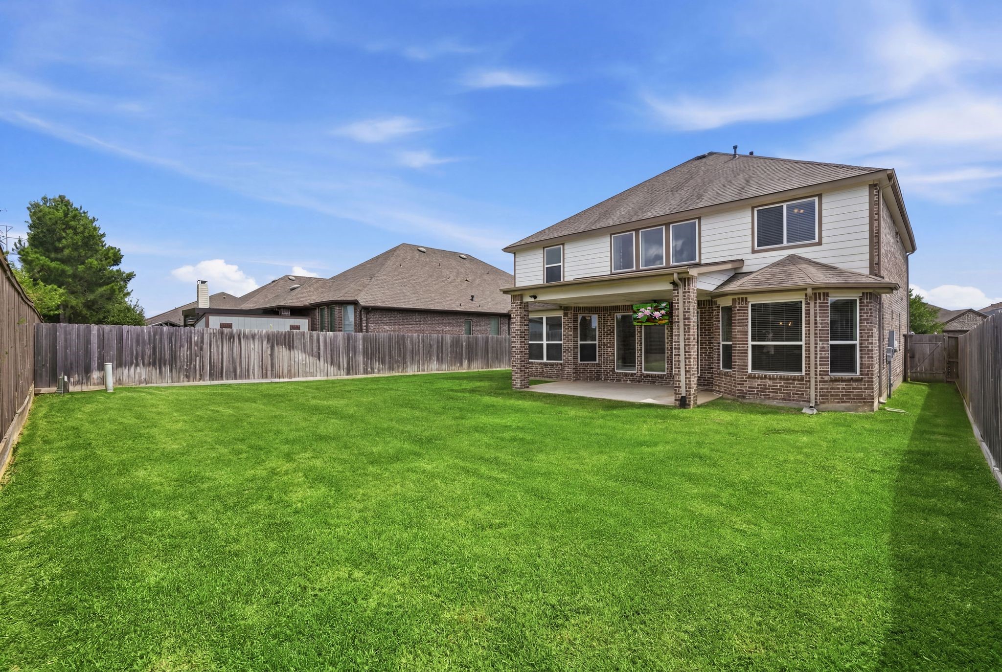 7522 Windsor View Drive Spring, TX 77379 - Photo 48 of 49 Spacious fenced backyard offering a peaceful setting and room to spread out.