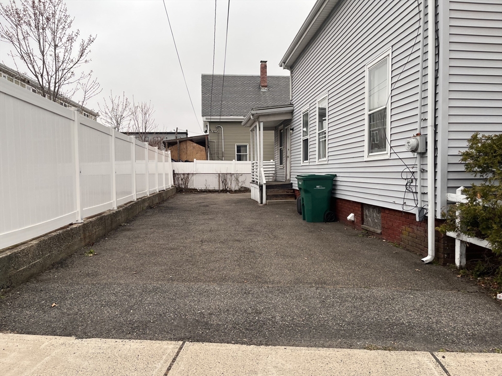 6 Minot Street, Unit 6 Lynn, MA 01905 - Photo 1 of 10 a view of a white house