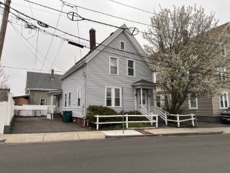 6 Minot Street, Unit 6 Lynn, MA 01905 - Photo 2 of 10 a view of a house with a street