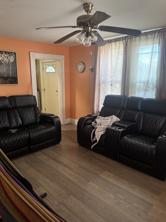 6 Minot Street, Unit 6 Lynn, MA 01905 - Photo 6 of 10 a bedroom with furniture and a window