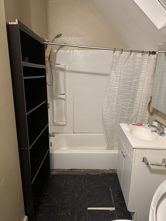 6 Minot Street, Unit 6 Lynn, MA 01905 - Photo 9 of 10 a bathroom with a sink and a shower