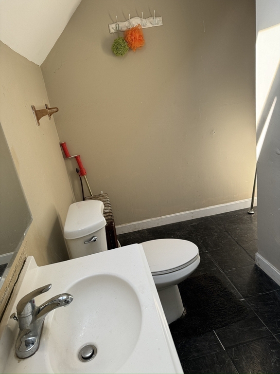 6 Minot Street, Unit 6 Lynn, MA 01905 - Photo 10 of 10 a bathroom with a toilet and a sink