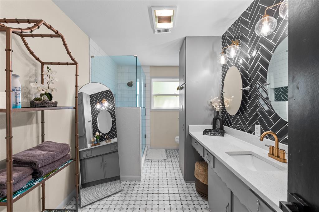 1933 Walter Smith Road Azle, TX 76020 - Photo 35 of 40 a bathroom with a sink and mirror