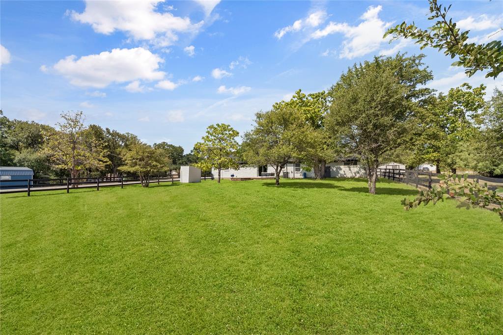 1933 Walter Smith Road Azle, TX 76020 - Photo 36 of 40 a view of yard with swimming pool and green space