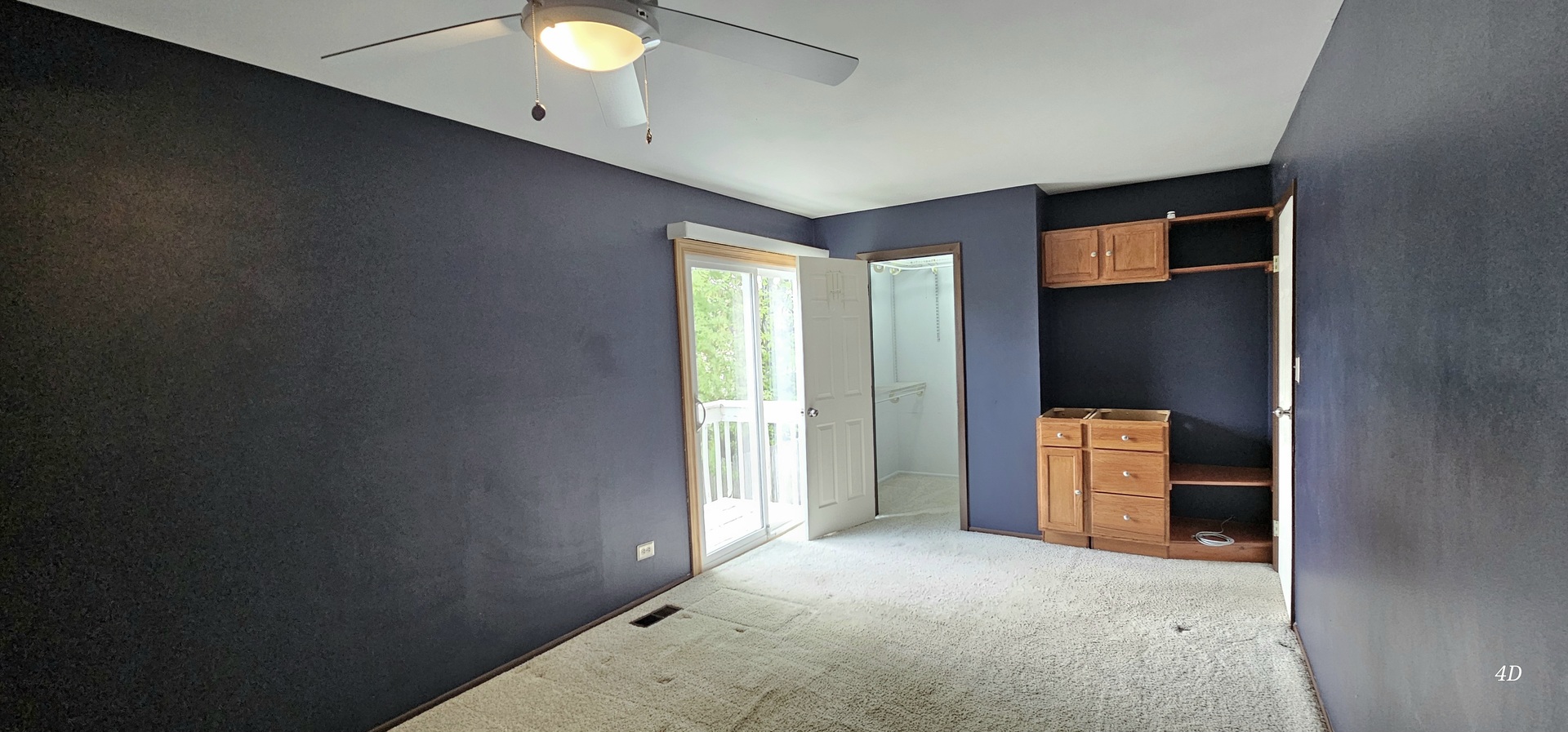 1497 Cornell Court Hoffman Estates, IL 60169 - Photo 13 of 30 a view of a livingroom with a ceiling fan and window