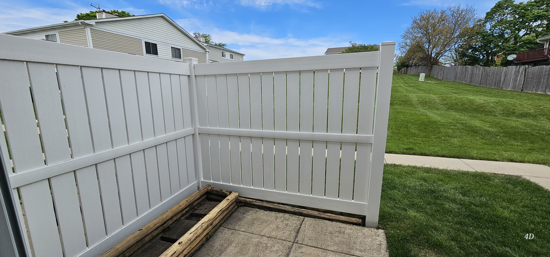 1497 Cornell Court Hoffman Estates, IL 60169 - Photo 22 of 30 a view of backyard with wooden fence