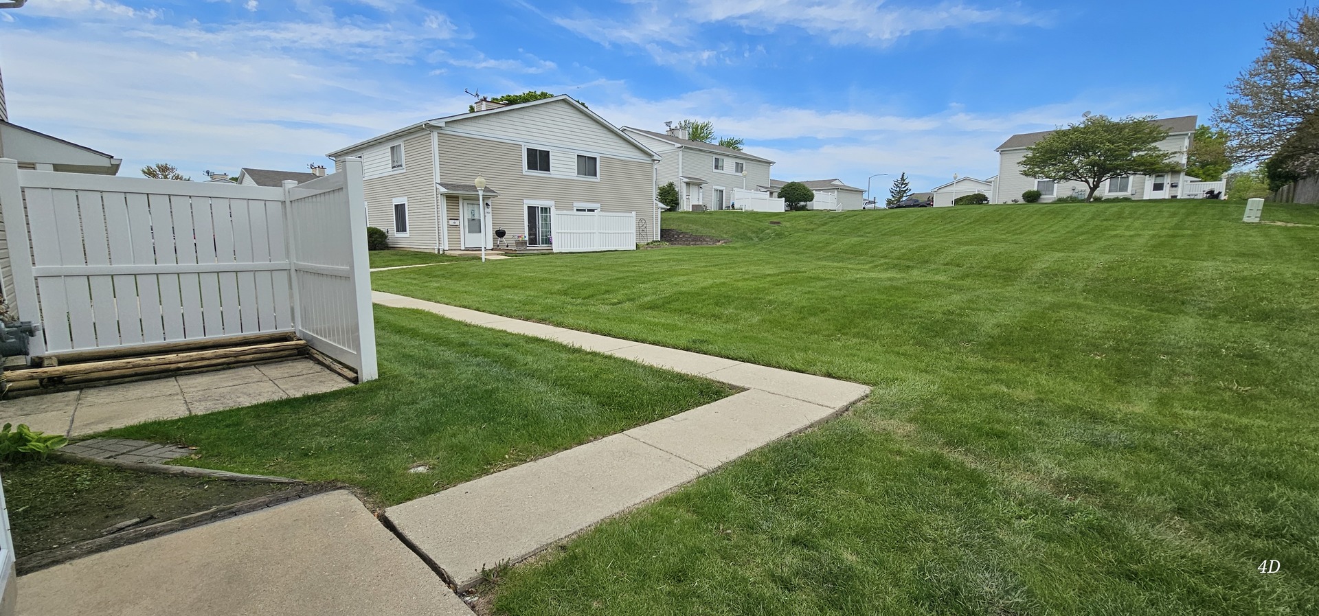 1497 Cornell Court Hoffman Estates, IL 60169 - Photo 23 of 30 a view of a house with a yard