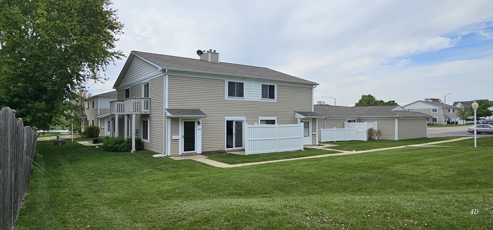 1497 Cornell Court Hoffman Estates, IL 60169 - Photo 26 of 30 a front view of house with yard and green space