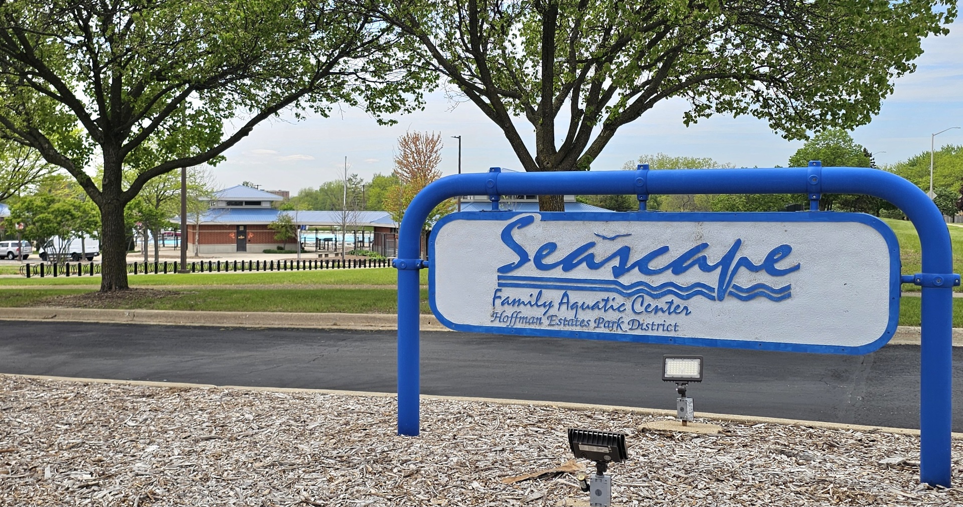1497 Cornell Court Hoffman Estates, IL 60169 - Photo 28 of 30 a sign board with a small yard