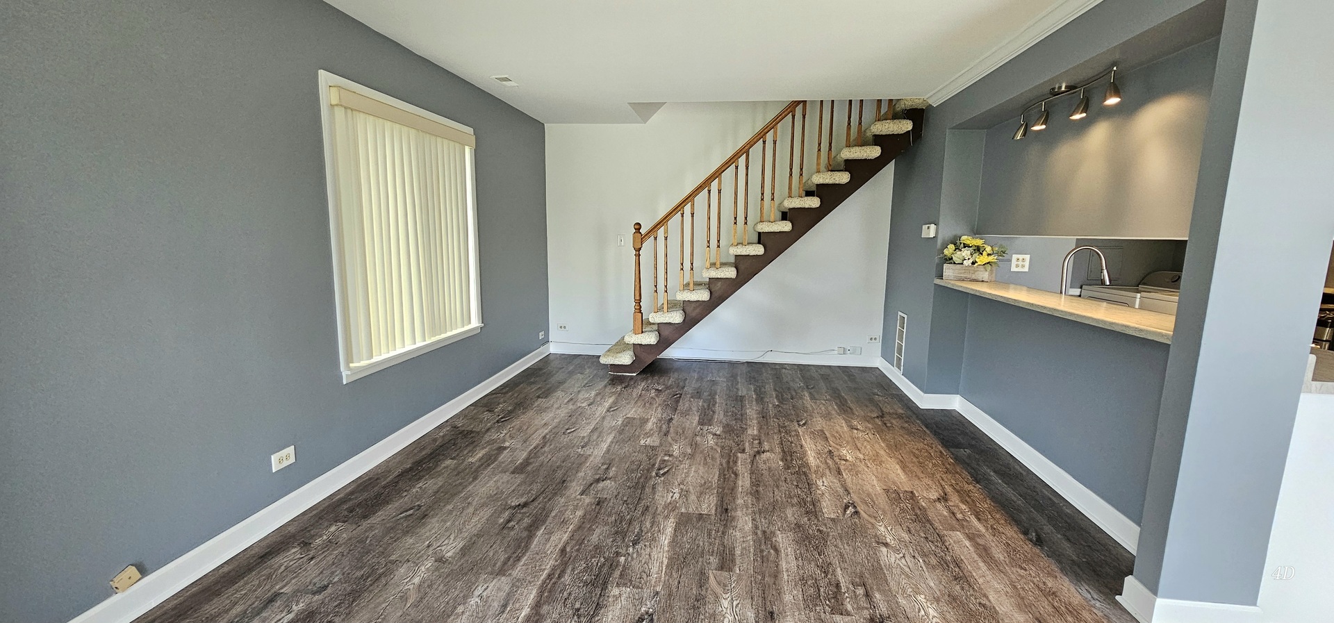 1497 Cornell Court Hoffman Estates, IL 60169 - Photo 3 of 30 a view of a hallway view with wooden floor and staircase
