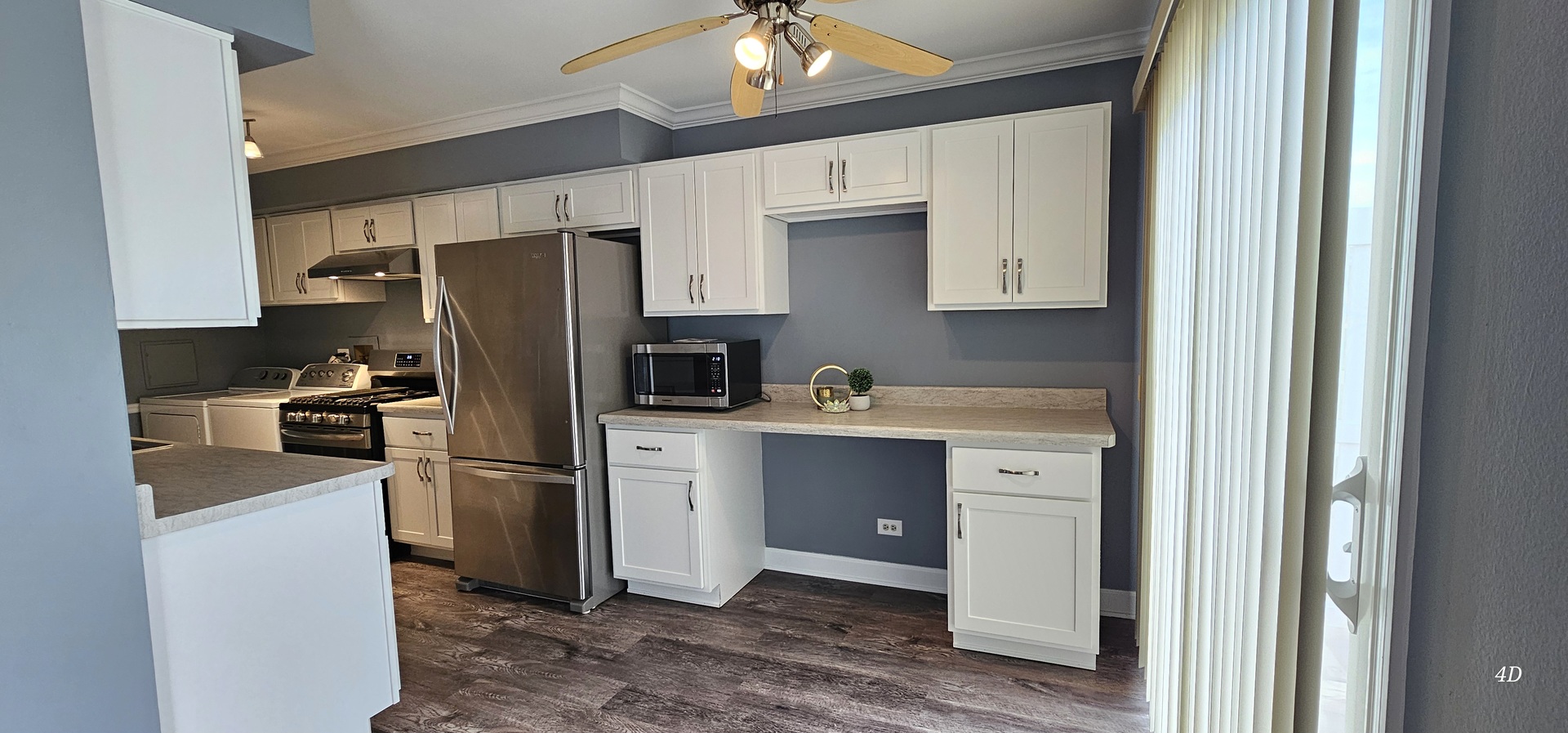 1497 Cornell Court Hoffman Estates, IL 60169 - Photo 10 of 30 a kitchen with refrigerator a microwave oven a sink and dishwasher