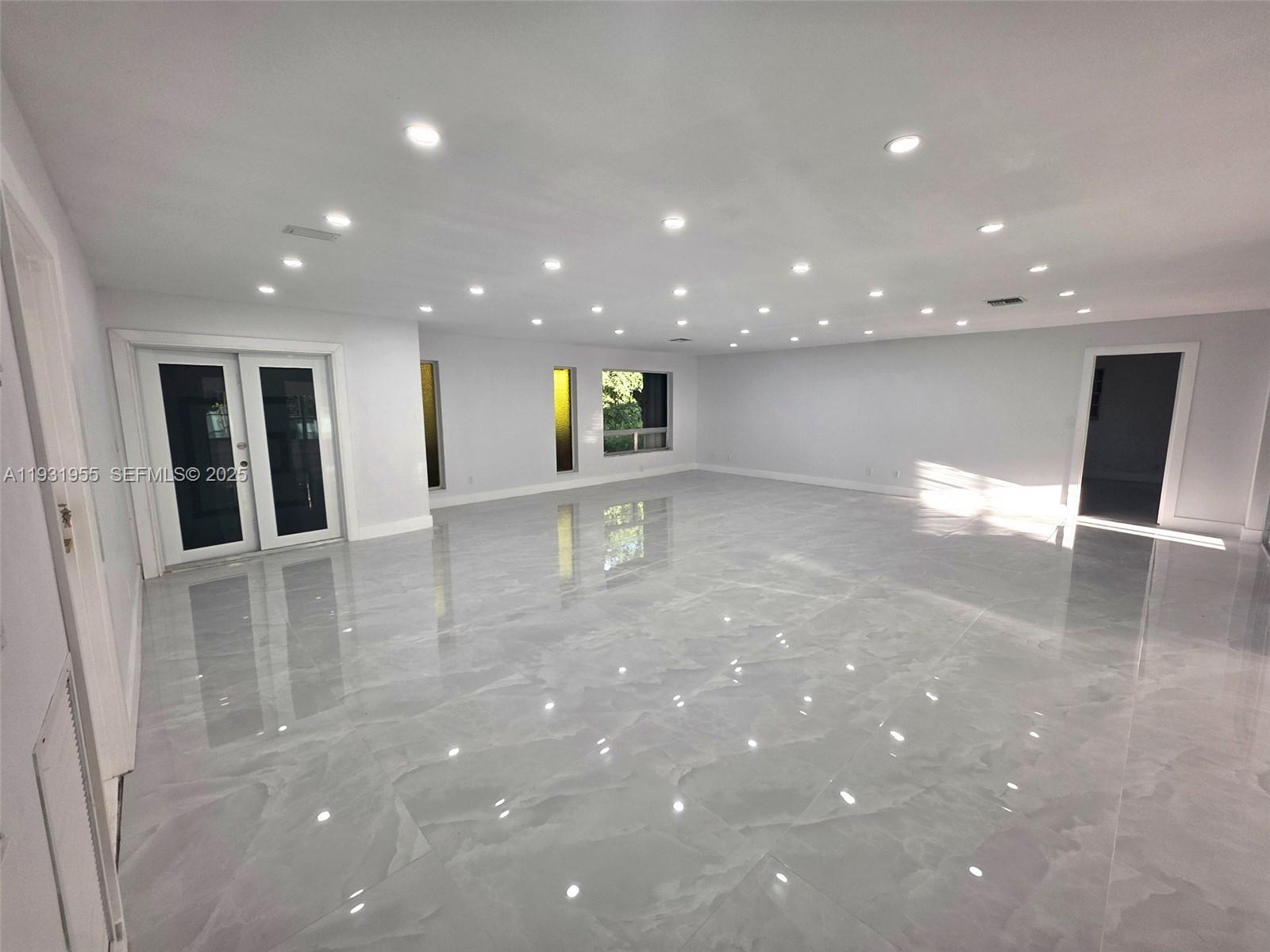 Davie Davie, FL 33314 - Photo 15 of 44 a view of an empty room with wooden floor