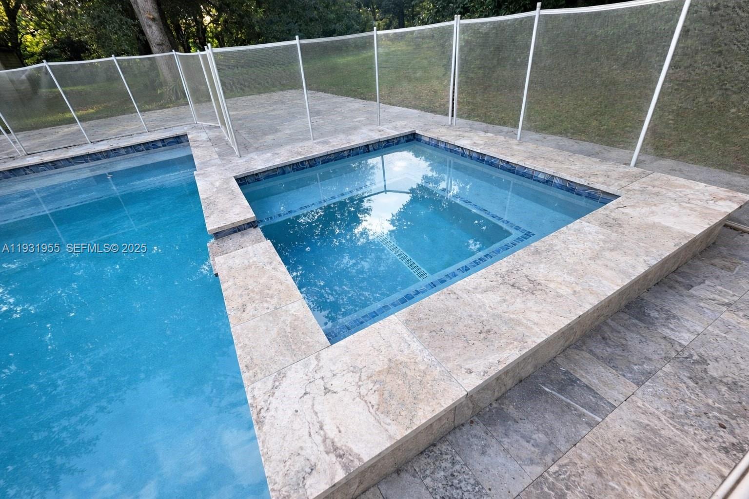 Davie Davie, FL 33314 - Photo 25 of 44 a view of sitting area and swimming pool