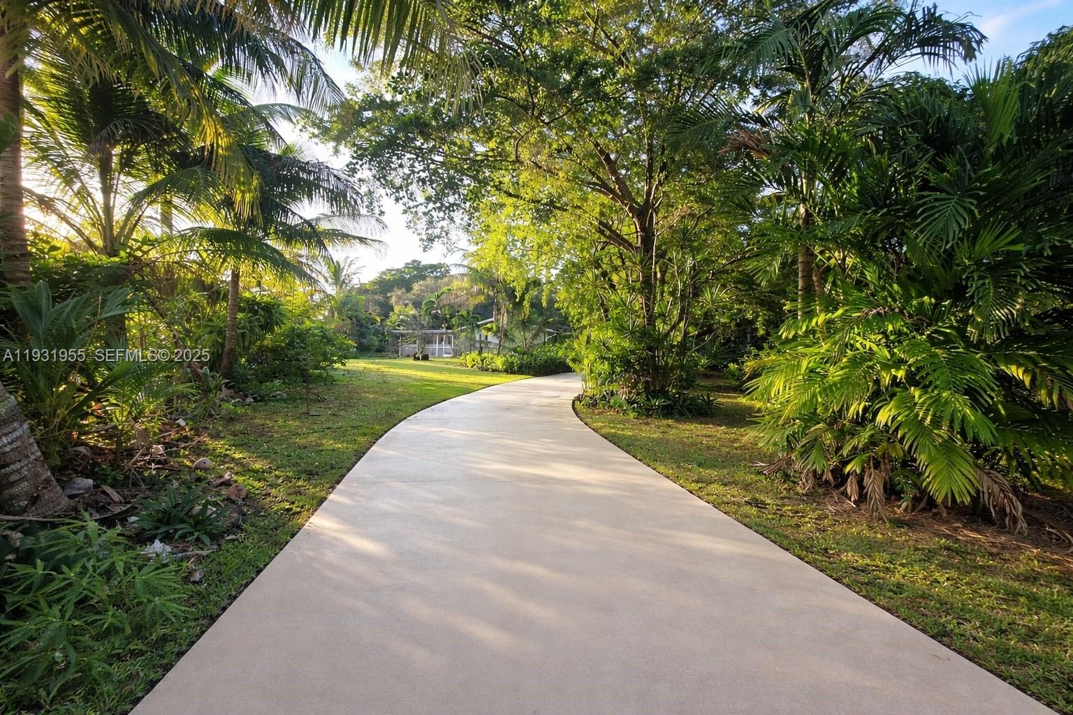 Davie Davie, FL 33314 - Photo 29 of 44 a view of street with a yard