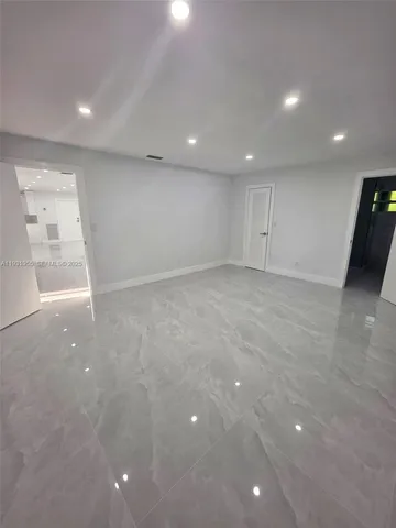 a kitchen with a sink and window