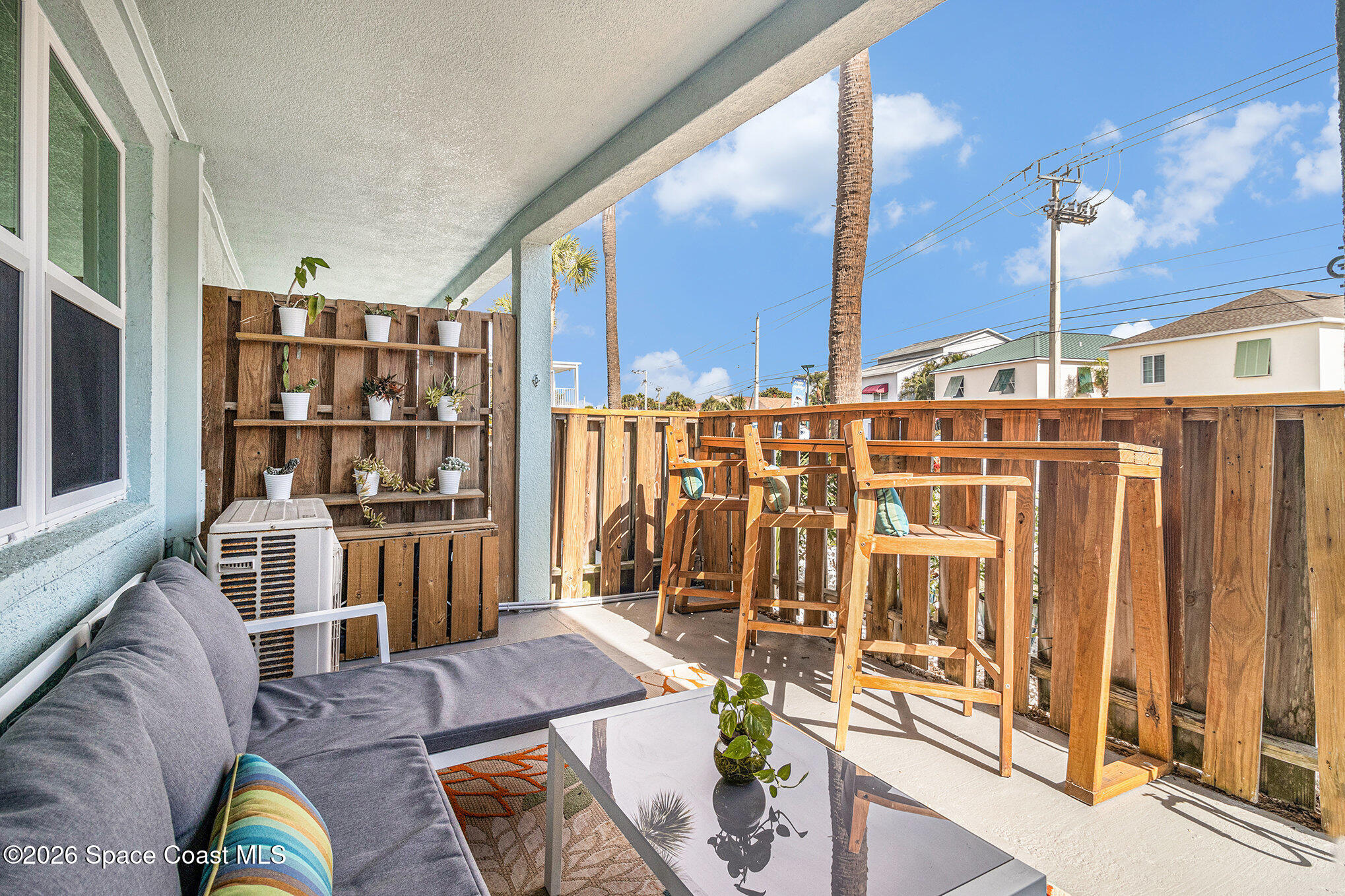 7605 Ridgewood Avenue, Unit 3 Cape Canaveral, FL 32920 - Photo 20 of 28 a living room with furniture