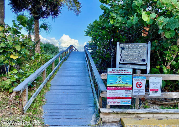 7605 Ridgewood Avenue, Unit 3 Cape Canaveral, FL 32920 - Photo 26 of 28 a sign that is on the side of a building
