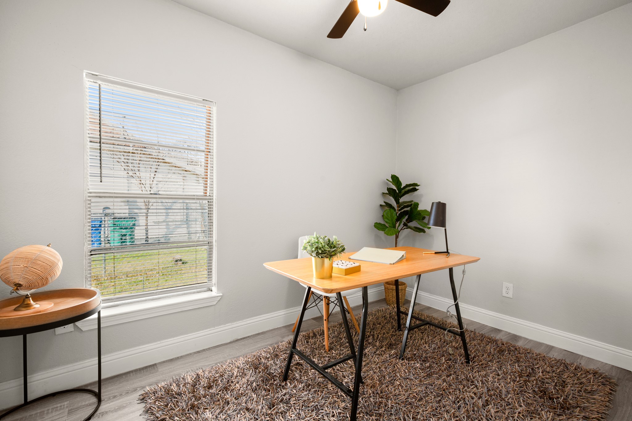 918 West 3rd Street Taylor, TX 76574 - Photo 16 of 22 Office with a ceiling fan and wood finished floors