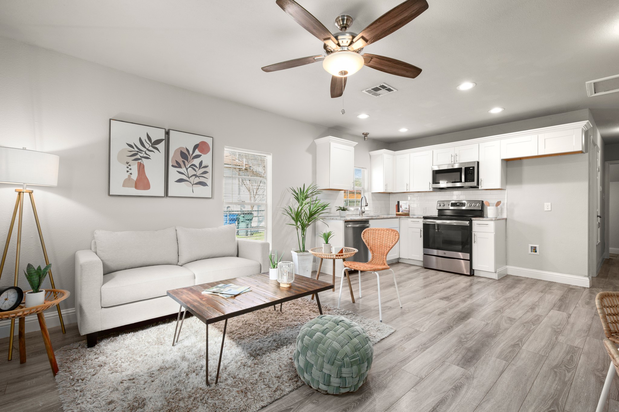 918 West 3rd Street Taylor, TX 76574 - Photo 5 of 22 Living room with ceiling fan, light wood finished floors, and recessed lighting