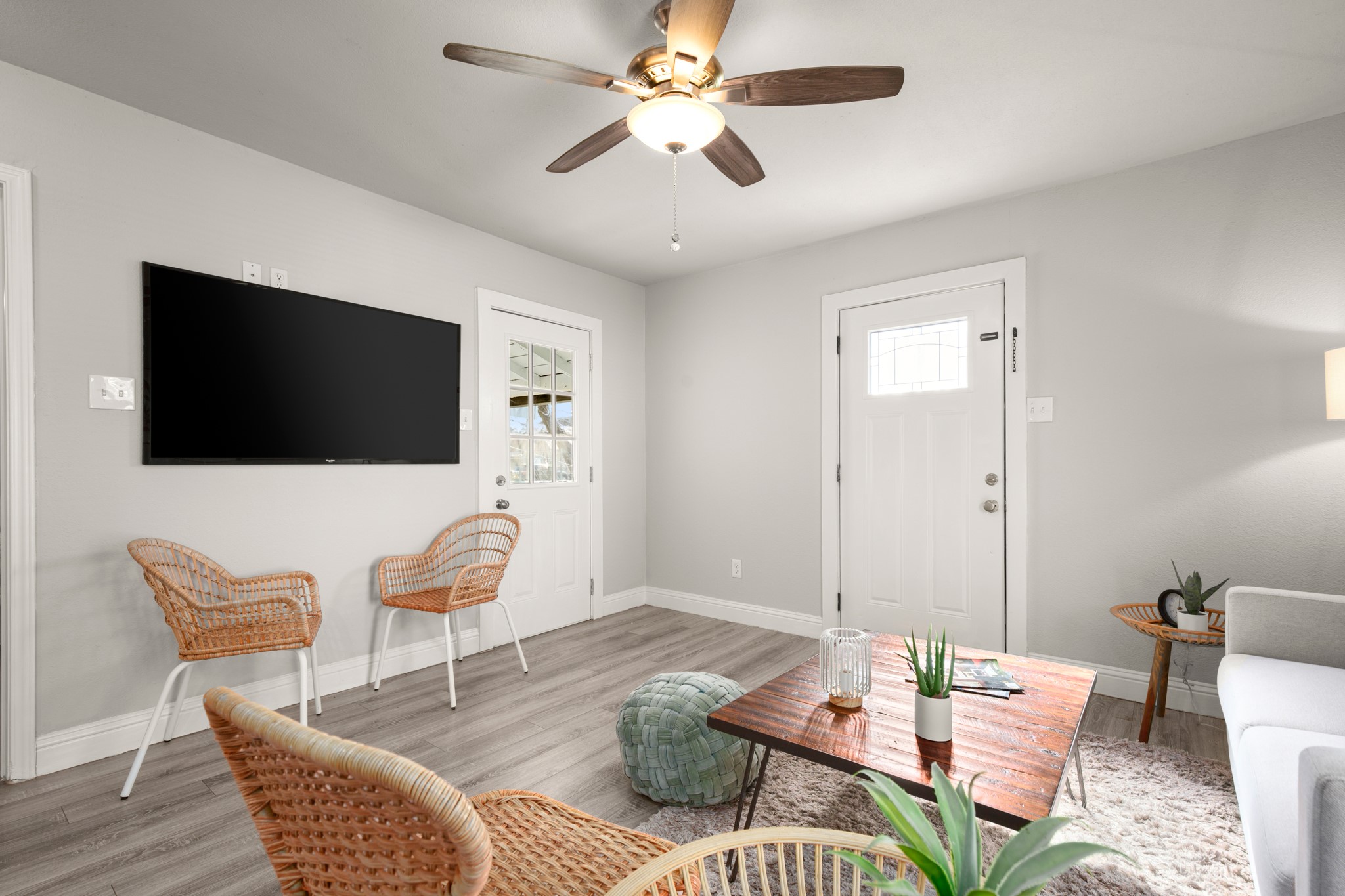 918 West 3rd Street Taylor, TX 76574 - Photo 8 of 22 Living room with wood finished floors and a ceiling fan