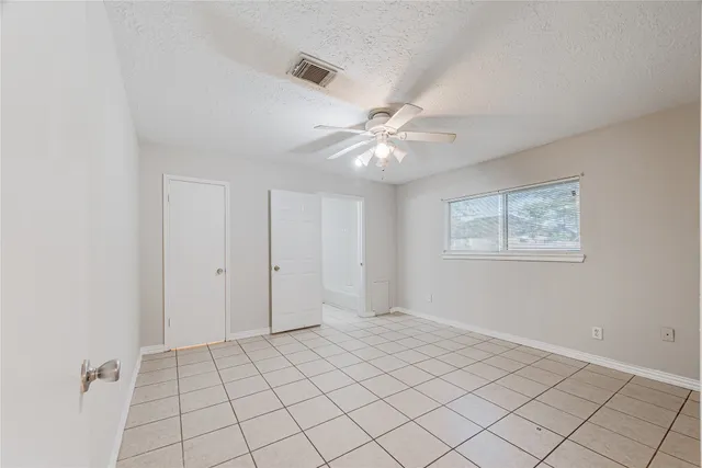 a view of an empty room with window