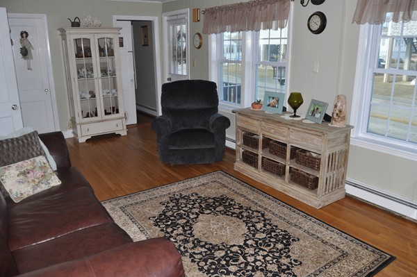 193 Swifts Beach Road Wareham, MA 02571 - Photo 8 of 24 a living room with furniture and wooden floor