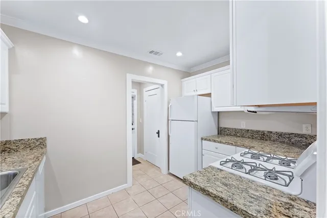 a view of kitchen and utility room
