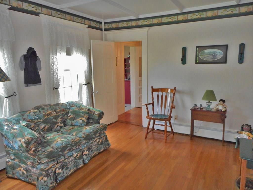 13 Old County Road Orland, ME 04472 - Photo 7 of 35 Den with shiny wood floor