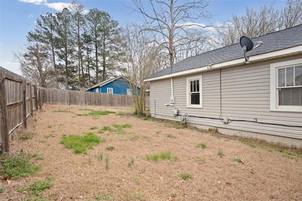202 Gordon Street Rockmart, GA 30153 - Photo 20 of 25 a backyard of a house
