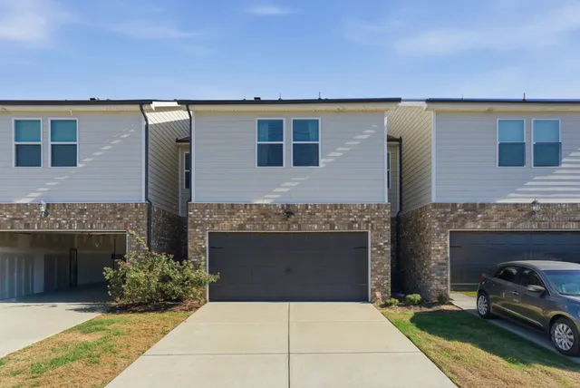 a house view with a garden space