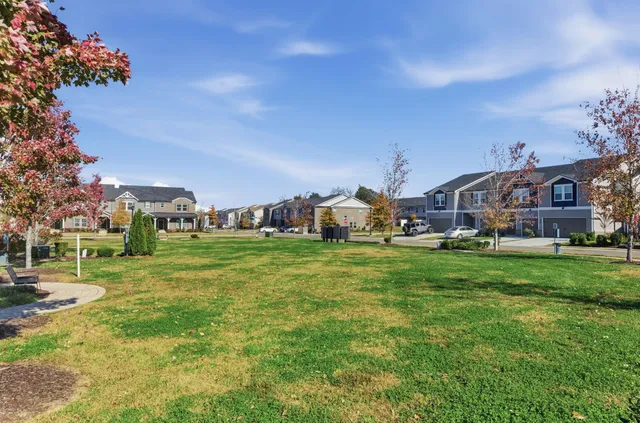 a aerial view of a house with a big yard