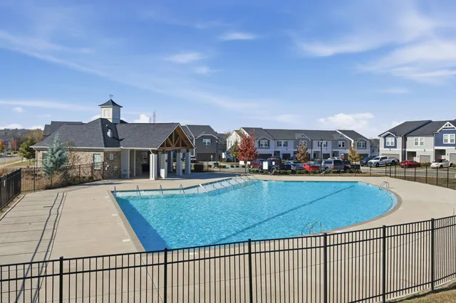 a view of swimming pool with outdoor seating