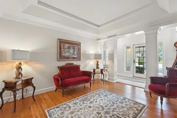 a kitchen with stainless steel appliances a refrigerator and wooden cabinets