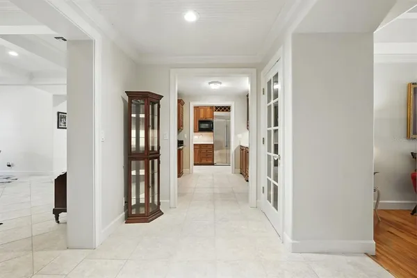 a view of a dining room with furniture and window