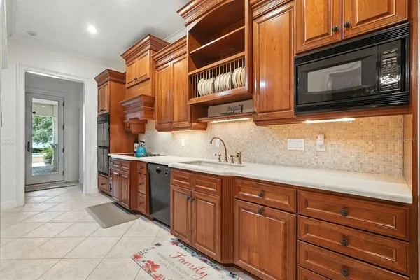 a view of a livingroom with furniture and a window