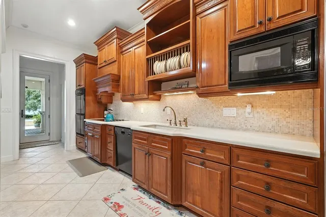 a view of a livingroom with furniture and a window