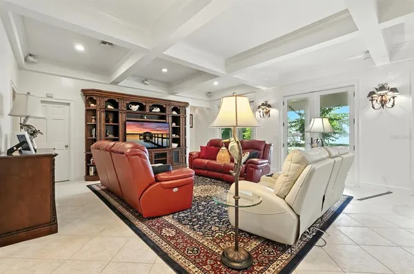 a bathroom with a sink a toilet and shower curtain